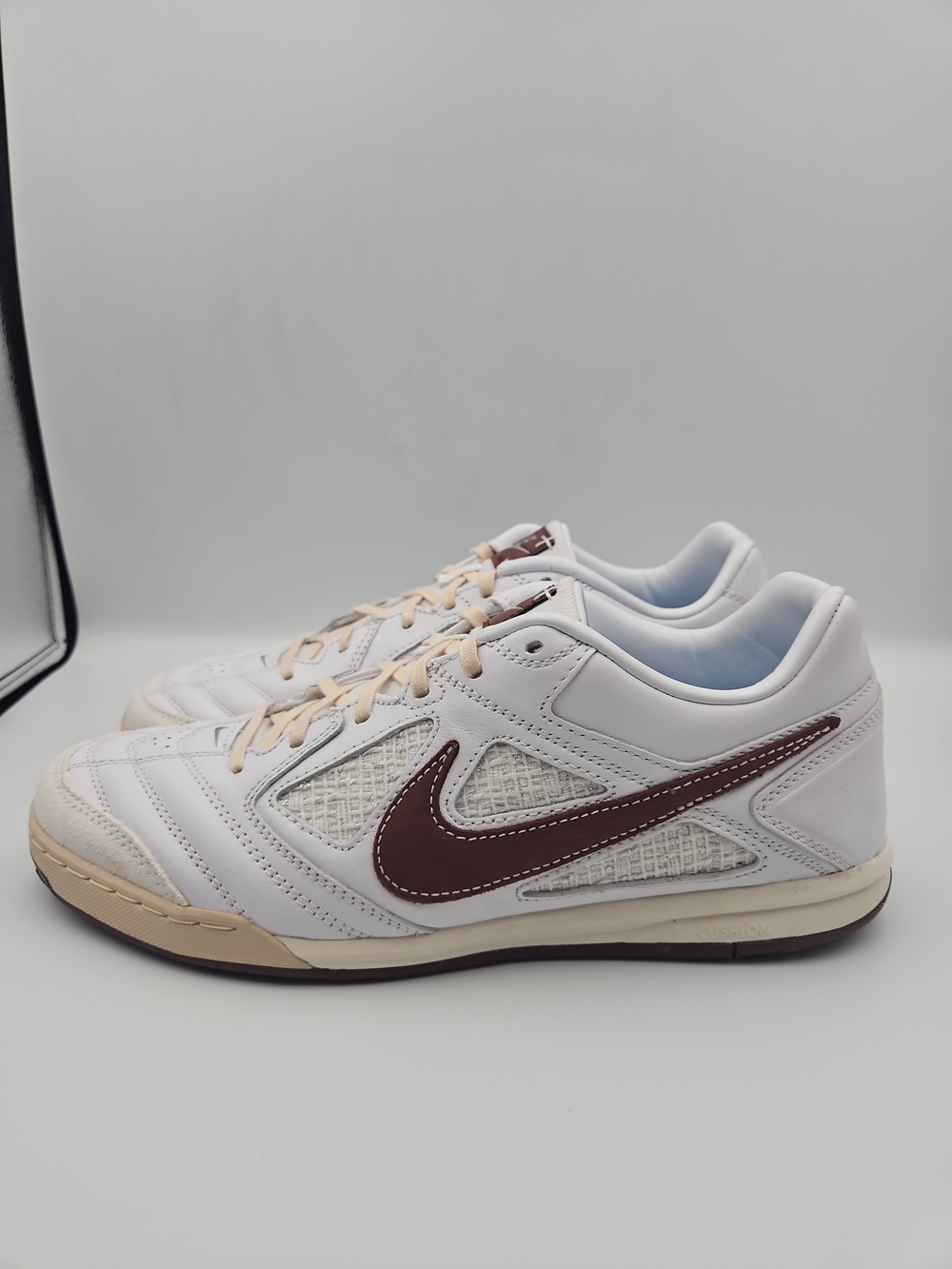 Nike Men’s White Sneakers with Brown Swoosh